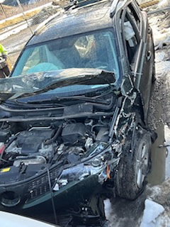 head on crash with car damage